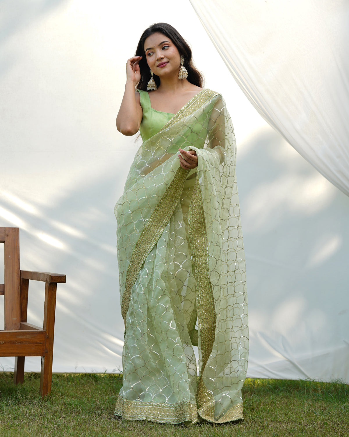 Gazing Light Green Sequence Worked Pure Organza Saree