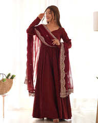 Divine Maroon Colored Heavy Roman Silk Chanderi Anarkali Gown