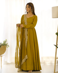 Divine Olive Green Colored Heavy Roman Silk Chanderi Anarkali Gown