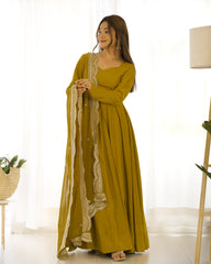 Divine Olive Green Colored Heavy Roman Silk Chanderi Anarkali Gown