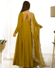 Divine Olive Green Colored Heavy Roman Silk Chanderi Anarkali Gown