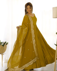 Divine Olive Green Colored Heavy Roman Silk Chanderi Anarkali Gown