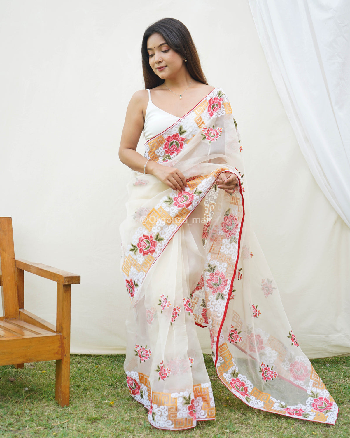 Opulent chikankari worked off white rich look pure organza saree