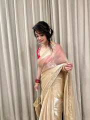 A Classic Golden Saree To Enhance Your Elegance