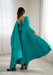 A twirl of teal, a touch of tradition
