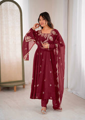 Maroon Elegance with a Touch of Festive Charm
