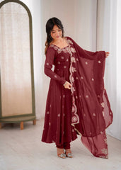 Maroon Elegance with a Touch of Festive Charm