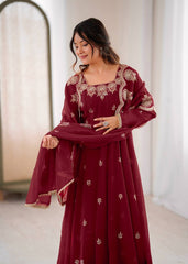 Maroon Elegance with a Touch of Festive Charm