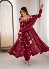 Maroon Elegance with a Touch of Festive Charm